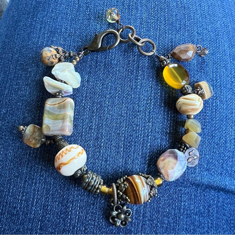 Handmade by artist: Bracelet made of different stones and accents.